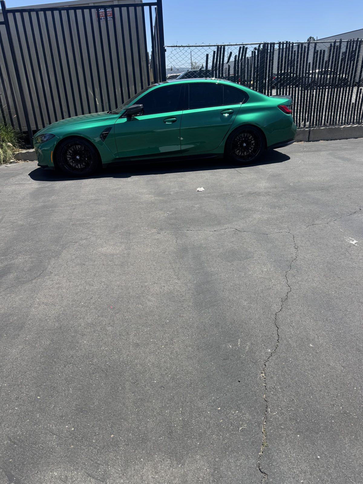 Isle of Man Green BMW M3 with dark ceramic tint