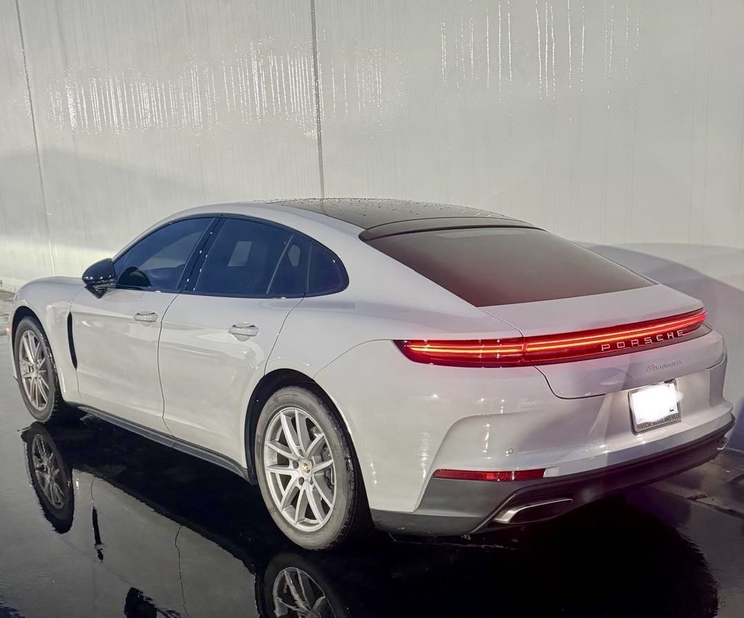White Porsche Panamera with tinted rear glass