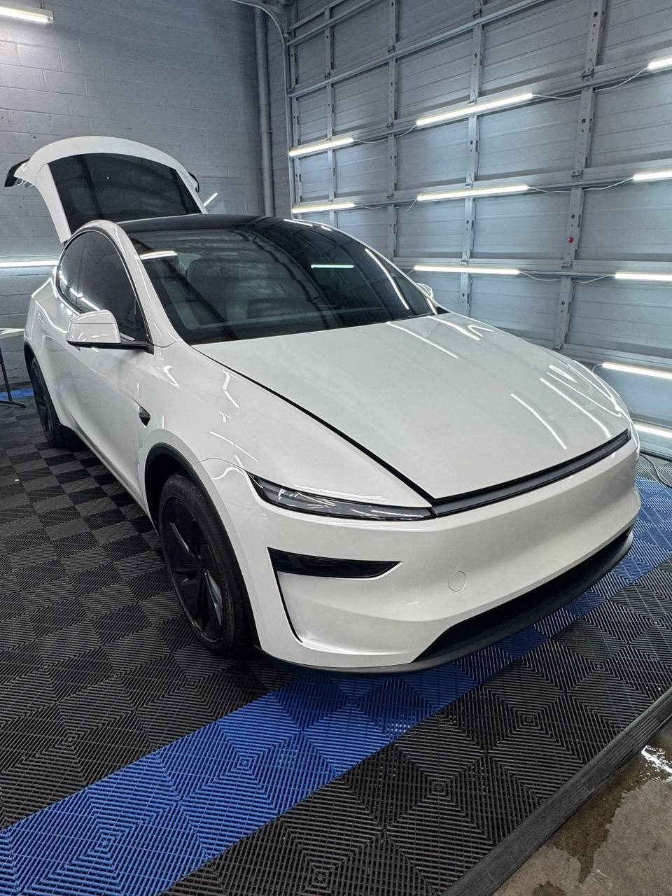 White Tesla Model Y with fresh ceramic tint